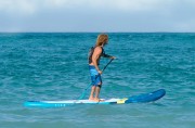 Aztron-Hydration-Bag-on-action-on-model-with-sup-board.jpg