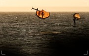 Szkrzydło_Duotone-Unit-at-sunset-time-2026-bright-orange.jpg