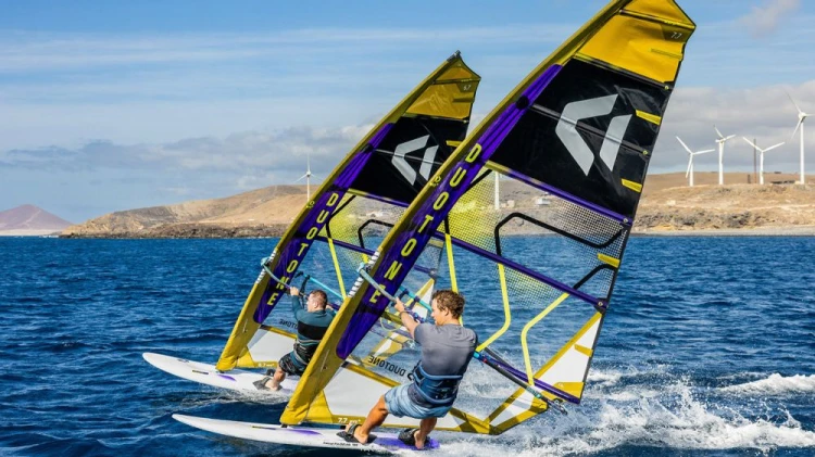 14260-1214_DUOTONE-Windsurf_Warp_Fin_Sail-2026-Black-Mustard.jpg