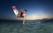Deska-Kite-twin-tip-Duotone-Select-Concept-Blue-at-the-sunset-on-water-2026-white.jpg
