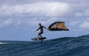 Deska-Skybrid-SLS-wing-board-one-the-waves-with-professional-surfer-2026-from-duotone-wingfoiling.jpg