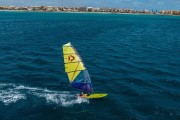14250-1205-Żagiel-duotone-Duke-SLS-sailing-on-ultra-freewave-board-2026-Yellow-Turquoise.jpg