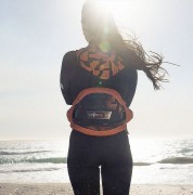 48253-4727-Trapez-Ion-Nova-back-view-on-lady-kitesurfer-2026-tiger-coral.jpg